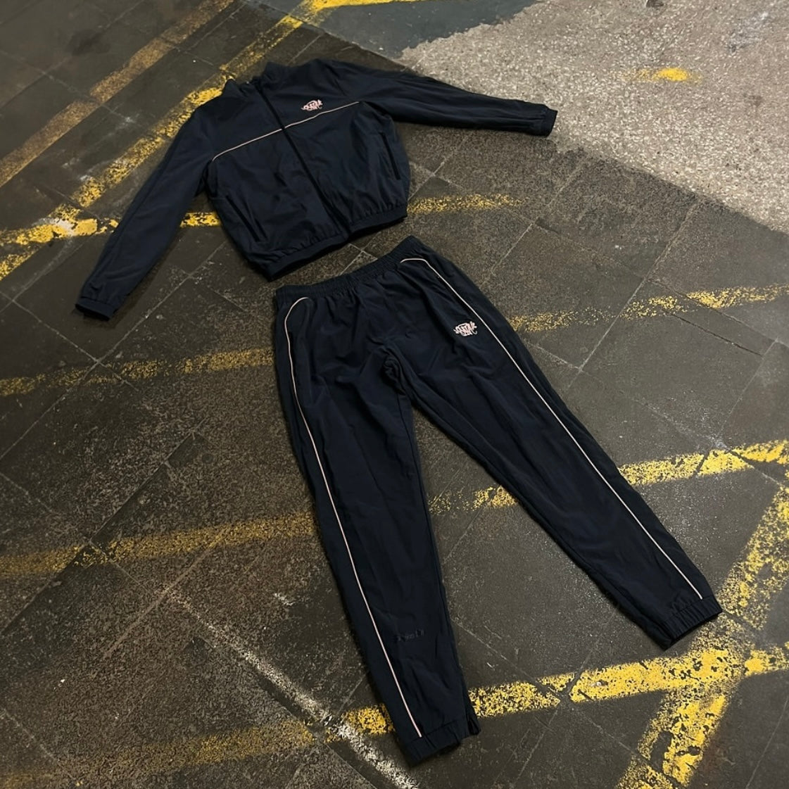 Syna World Logo Shell Tracksuit - Black / Rose Gold
